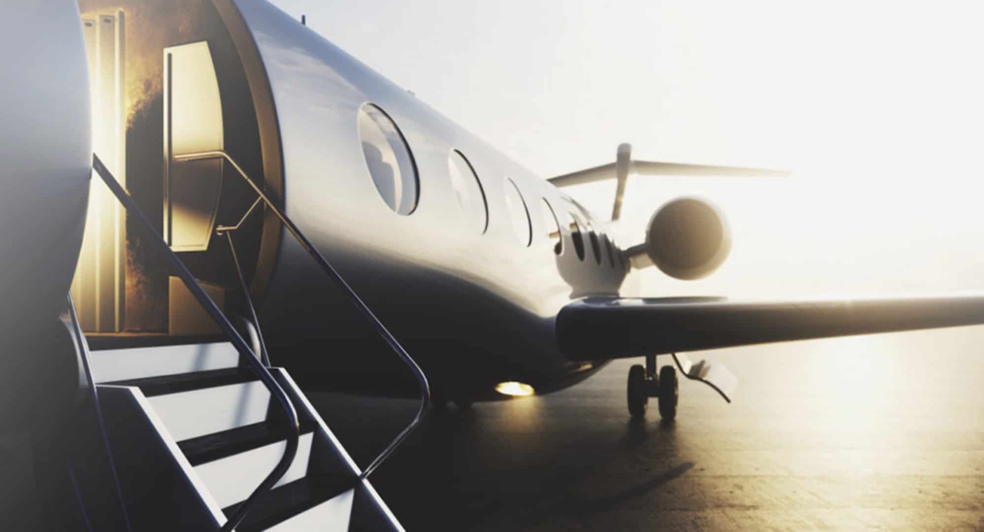 Private jet at sunset